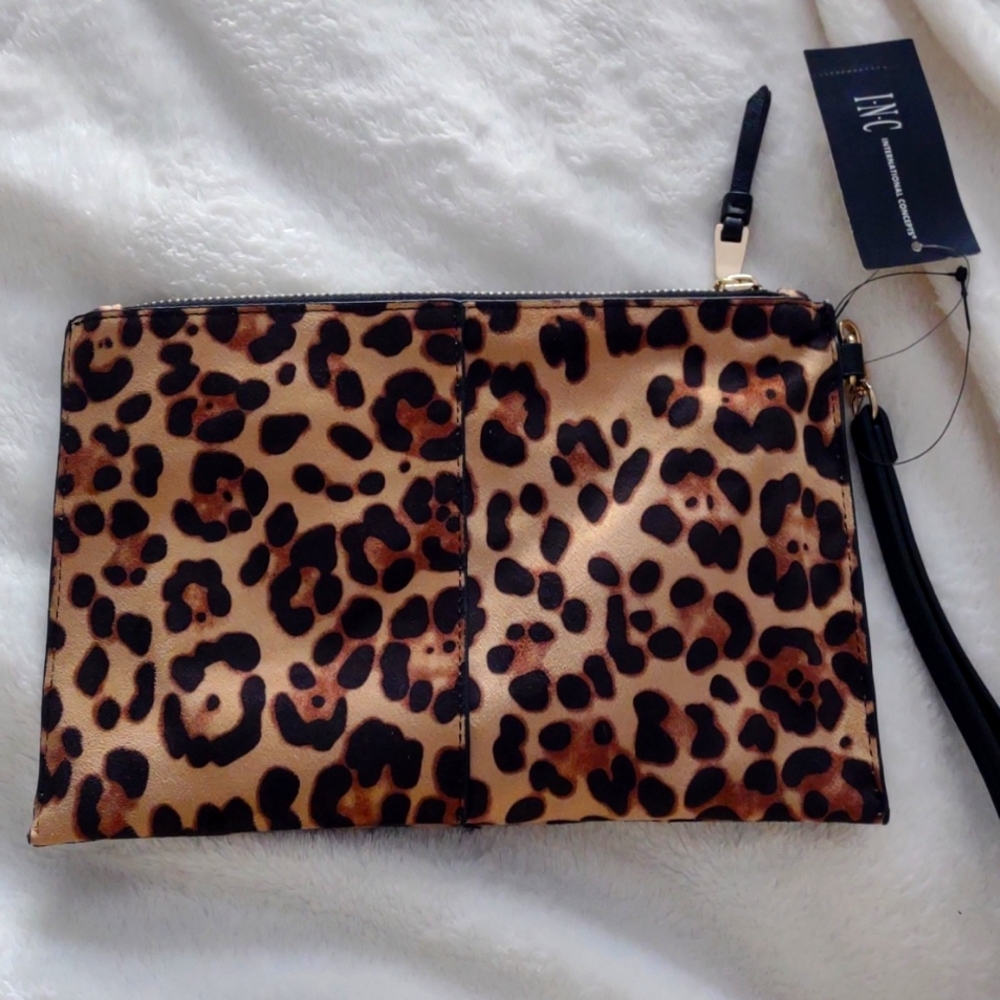 Inc Leopard print wristlet clutch. Never used. New with tags